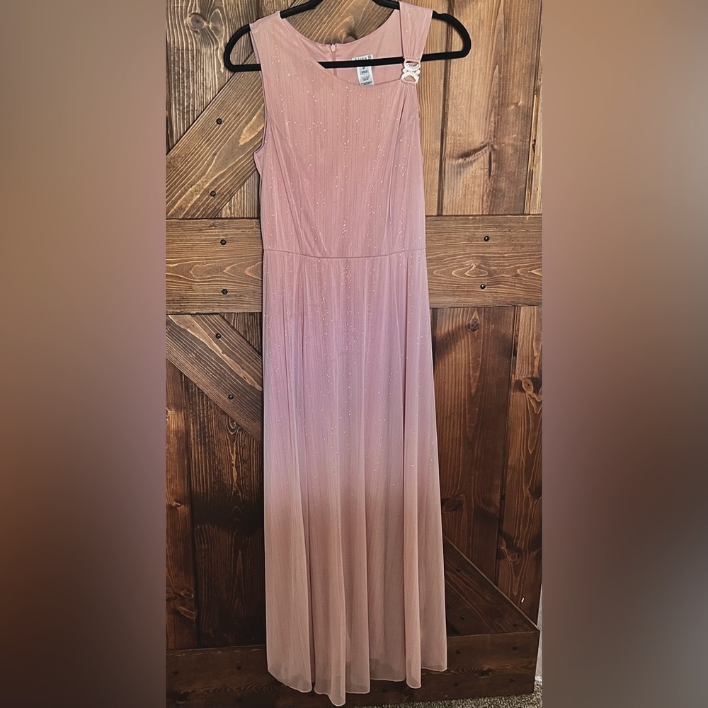 Pink dress with gold sparkles.